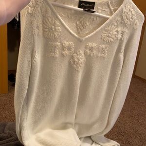White sweater with gems and flowers